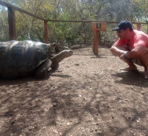 Photo with a huge Galapagos tortoise